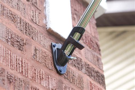 mounting metal bracket on brick exterior|brick flag pole brackets.